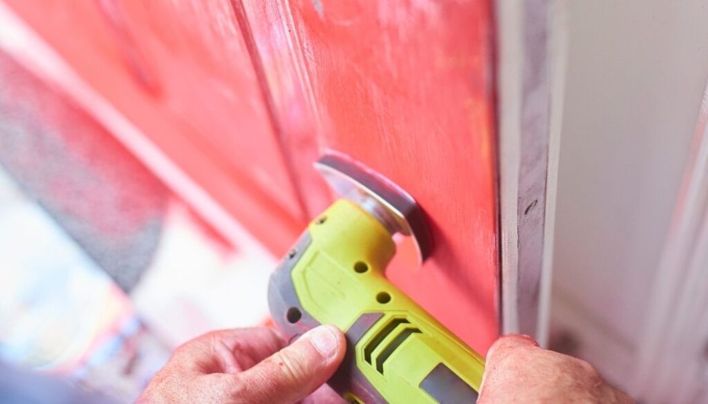 Why should you sand between coats of paint?